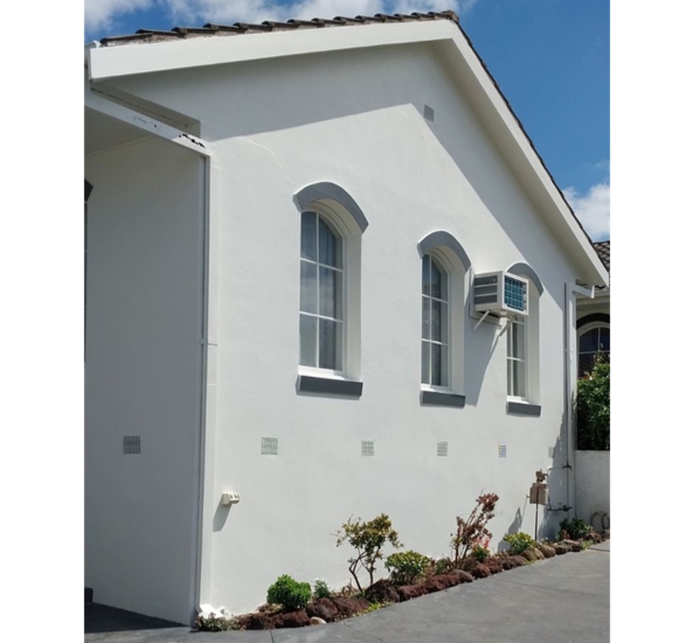 AFTER - Pressure wash was followed by the final step, a whitewash/paint for a perfect finish.